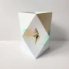 origami-windlicht-muschel-kollektion-meeresbrise Sand-Türkises Origami-Windlicht zum Basteln mit maritimem Muschel-Motiv, Kollektion Meeresbrise.